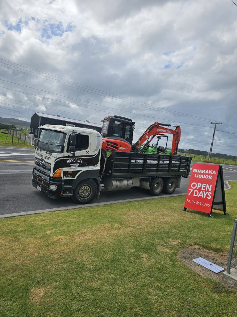 Large digger in truck