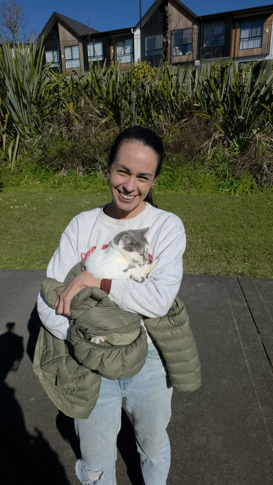 Danny the rescued cat safely reunited with his owner after an Auckland tree rescue
