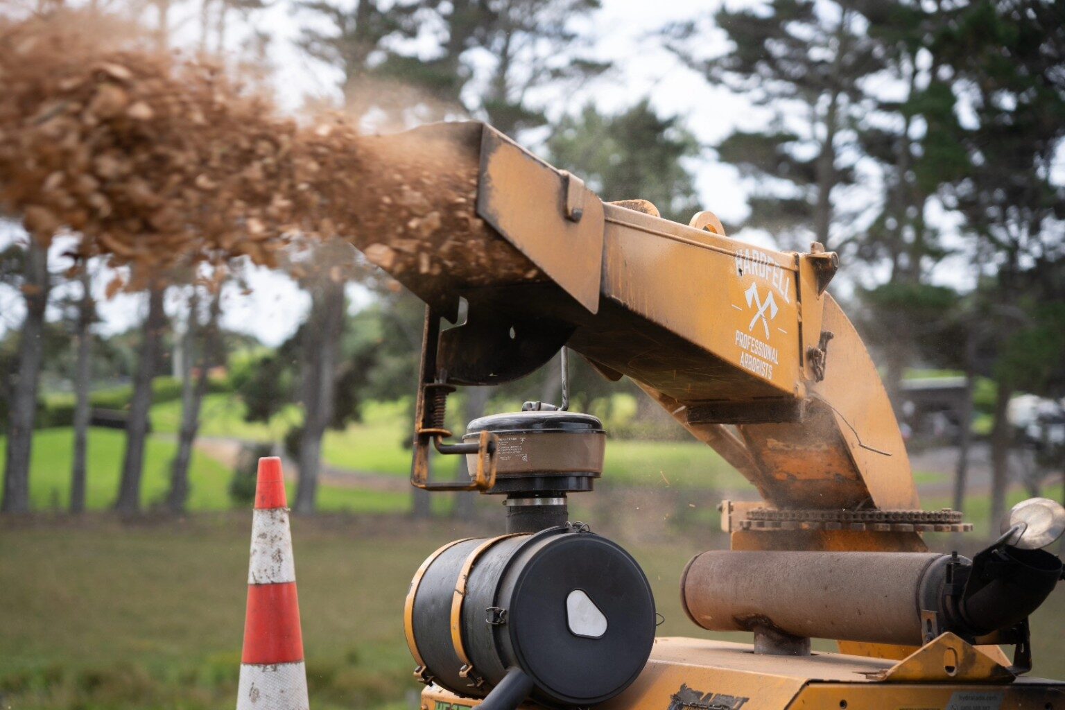 Hardfell wood chipper producing fresh arborist mulch in Auckland